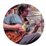 Jason Kramer playing guitar